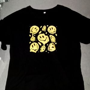 I'm sell this smiley face shirt from Romwe, the size is an XL and color is black